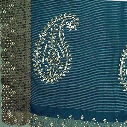 Ratnalekha silk saree in rich teal-blue base adorned with intricate gold zari work,