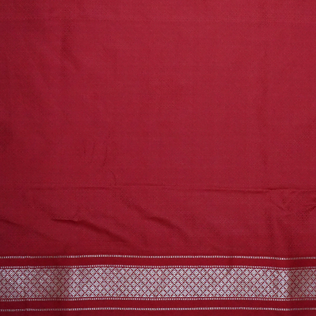 Rithvi Satin Deep red color adorned with intricate golden zari embroidery