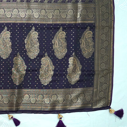 Tarani Silk saree in royal deep purple shade with a rich golden zari weave.