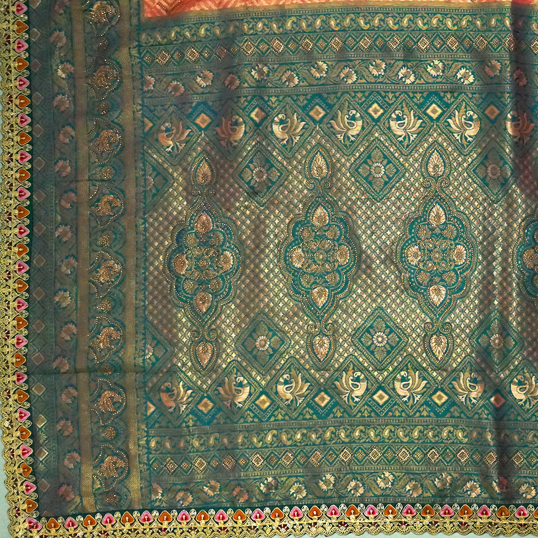 Peach-orange Raj Virasat Silk saree with Deep purple base and heavy embroidery.