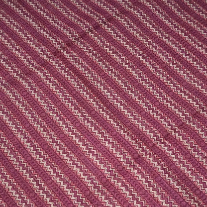 Harini Tussar in soft beige base with maroon leaf motifs and a matching brownish-maroon border, creating an elegant and earthy look.