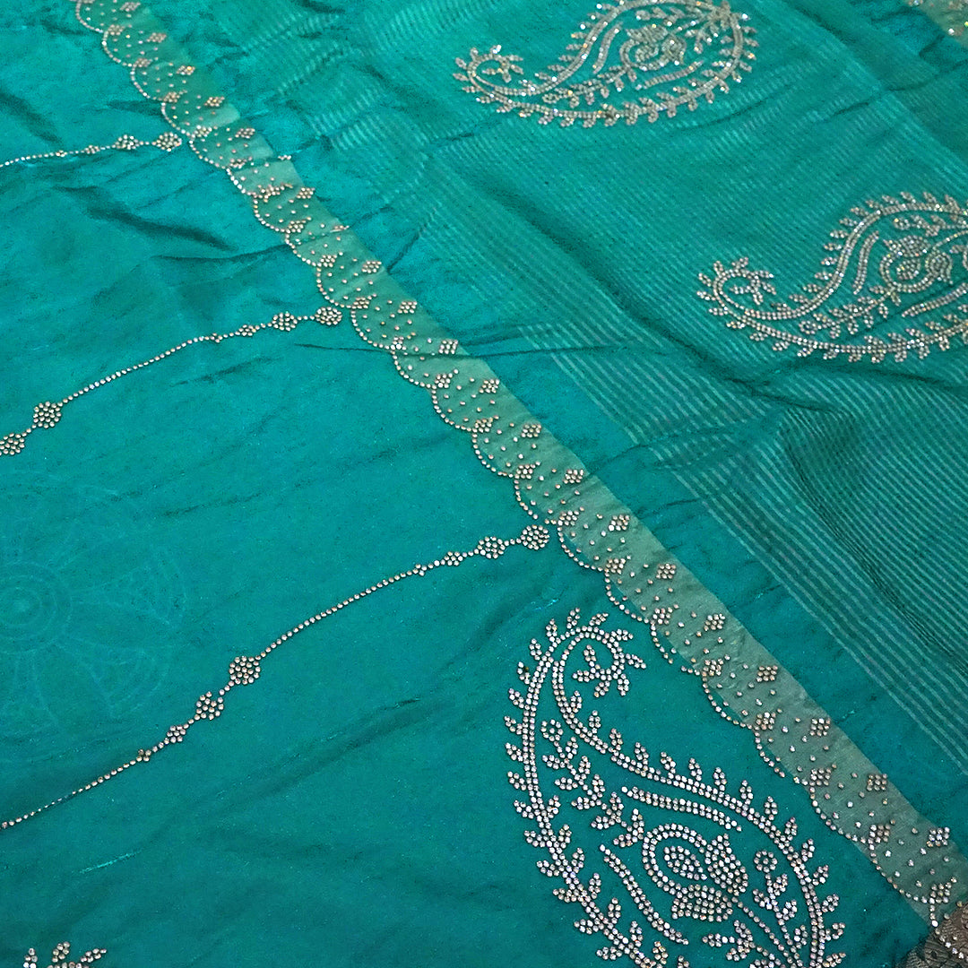 Ratnalekha Silk saree in rich emerald-green base accentuated with intricate gold zari work