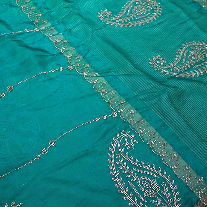 Ratnalekha Silk saree in rich emerald-green base accentuated with intricate gold zari work