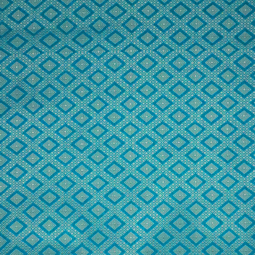 Neera Silk Saree in Vibrant Turquoise Blue with Floral works