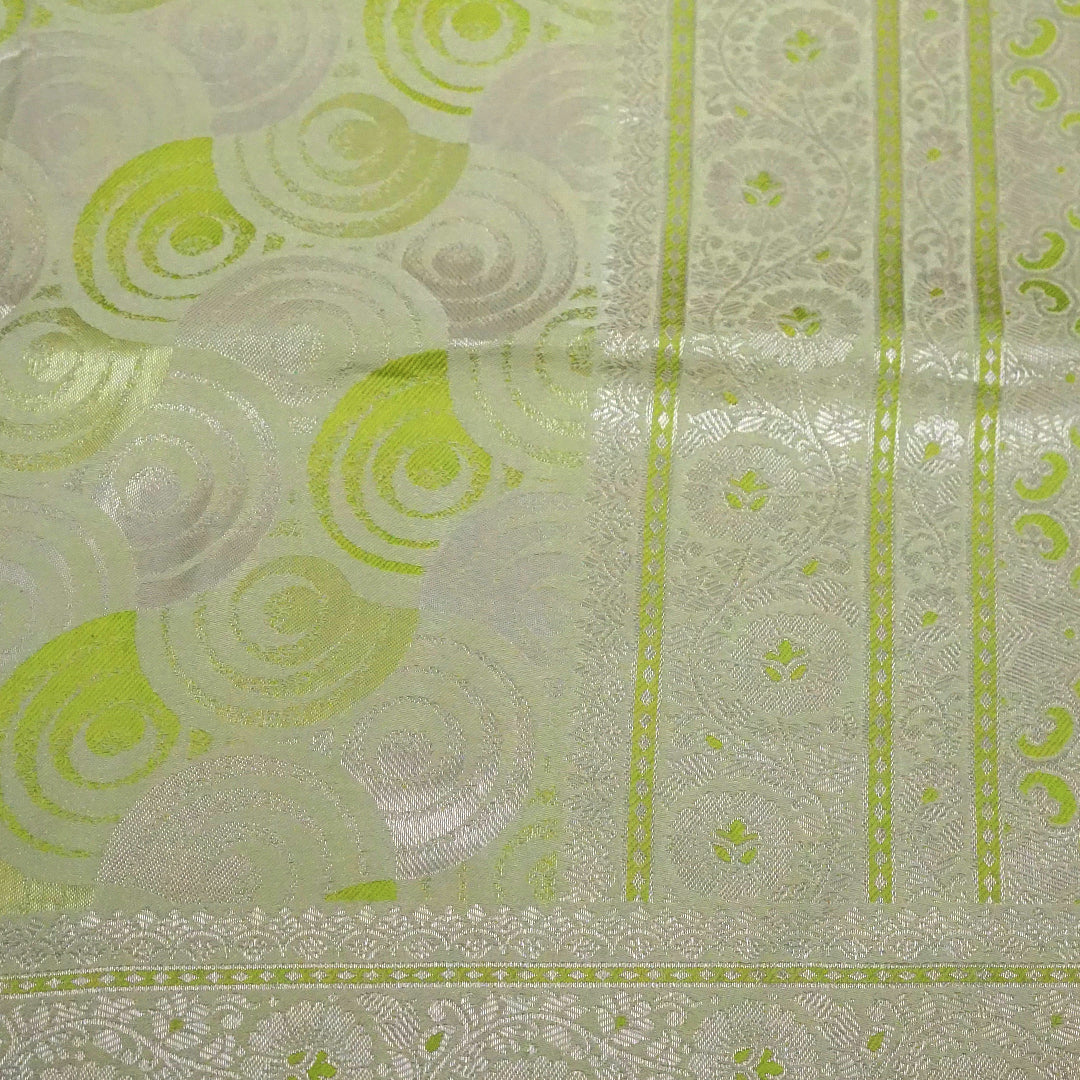 Soothing light olive green shade Suhani Silk with a subtle golden sheen