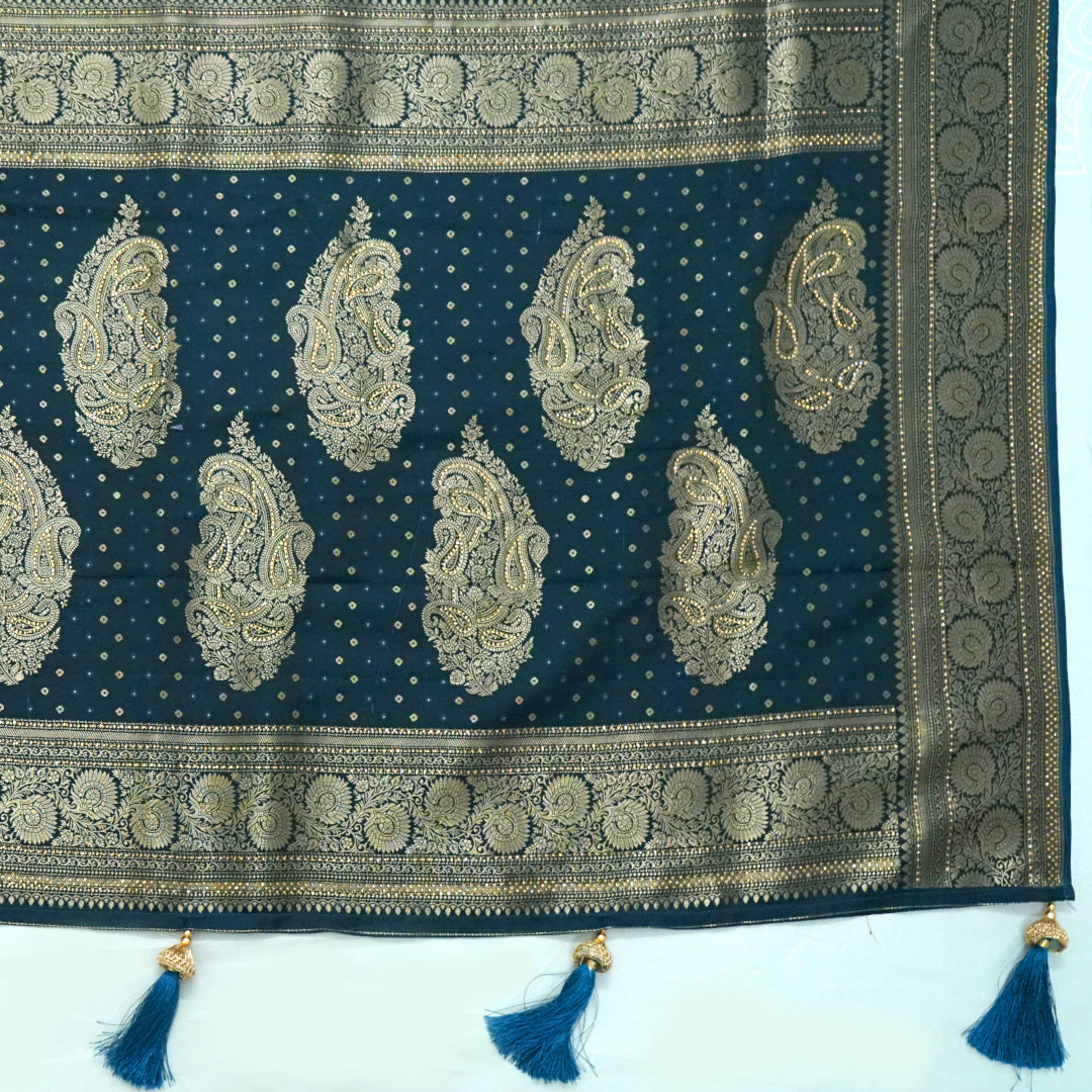 Tarani Silk saree in deep navy blue shade with a rich golden zari weave.