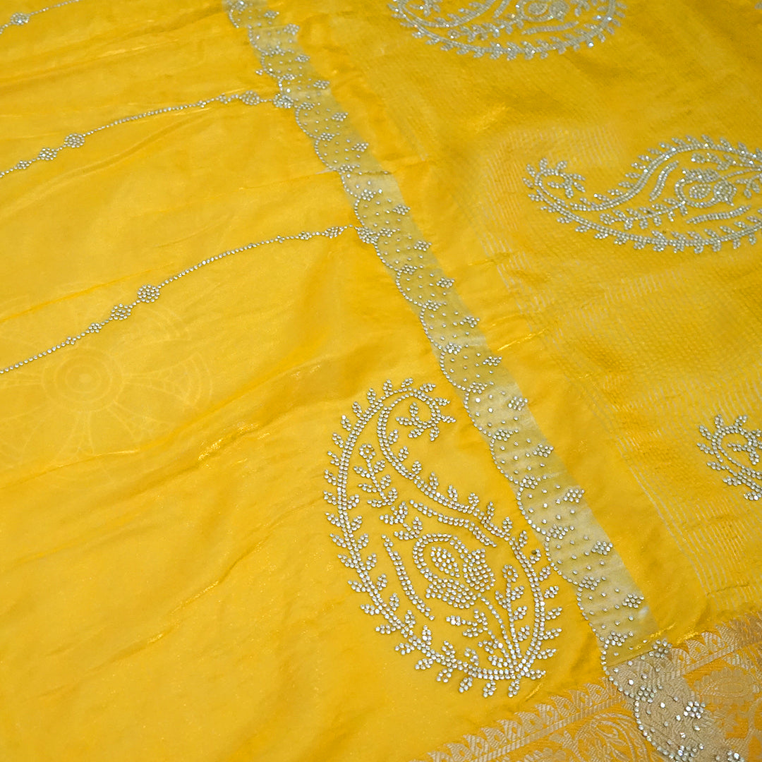 Ratnalekha Silk saree in rich golden yellow base highlighted with intricate silver zari embroidery