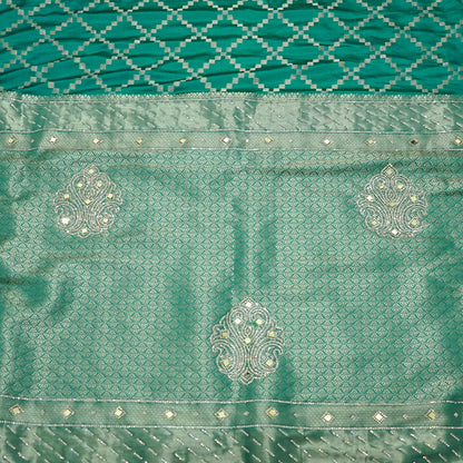 Samrudhi silk saree in vibrant combination of emerald green and lime green with a lustrous Banarasi silk finish.