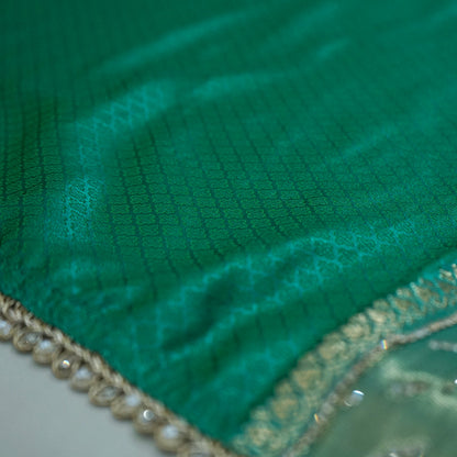 Samrudhi silk saree in vibrant combination of emerald green and lime green with a lustrous Banarasi silk finish.