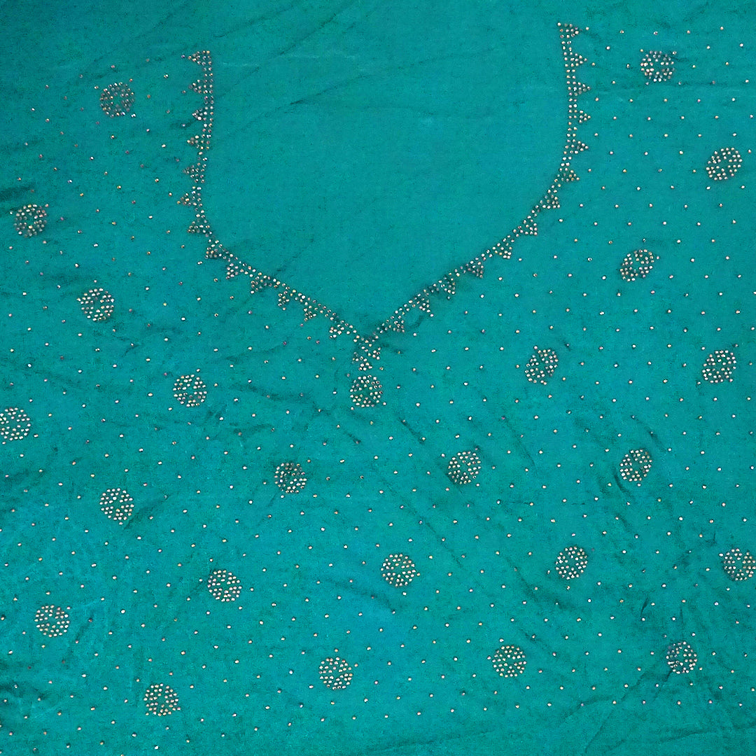 Ratnalekha Silk saree in rich emerald-green base accentuated with intricate gold zari work