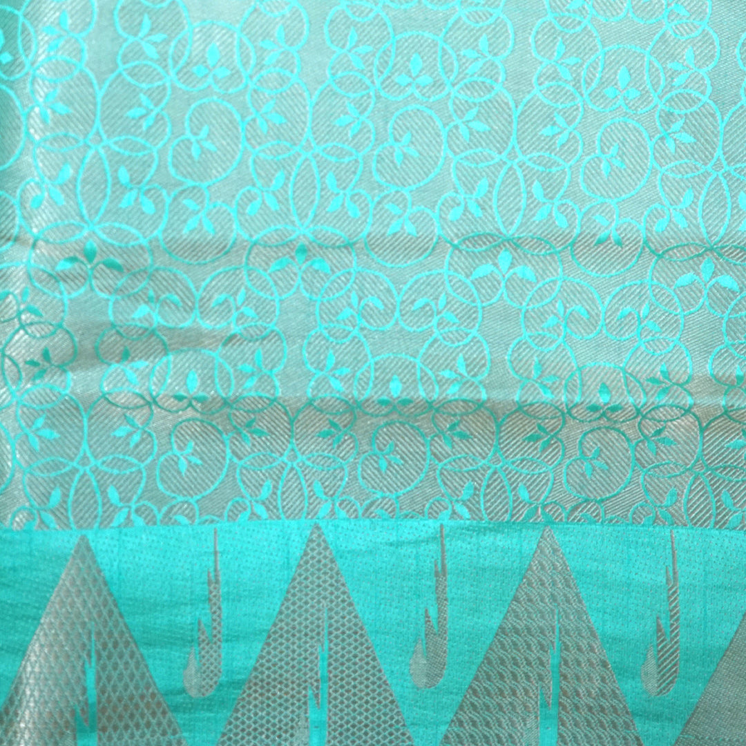 Chandhrika in Aqua Blue base with floral works