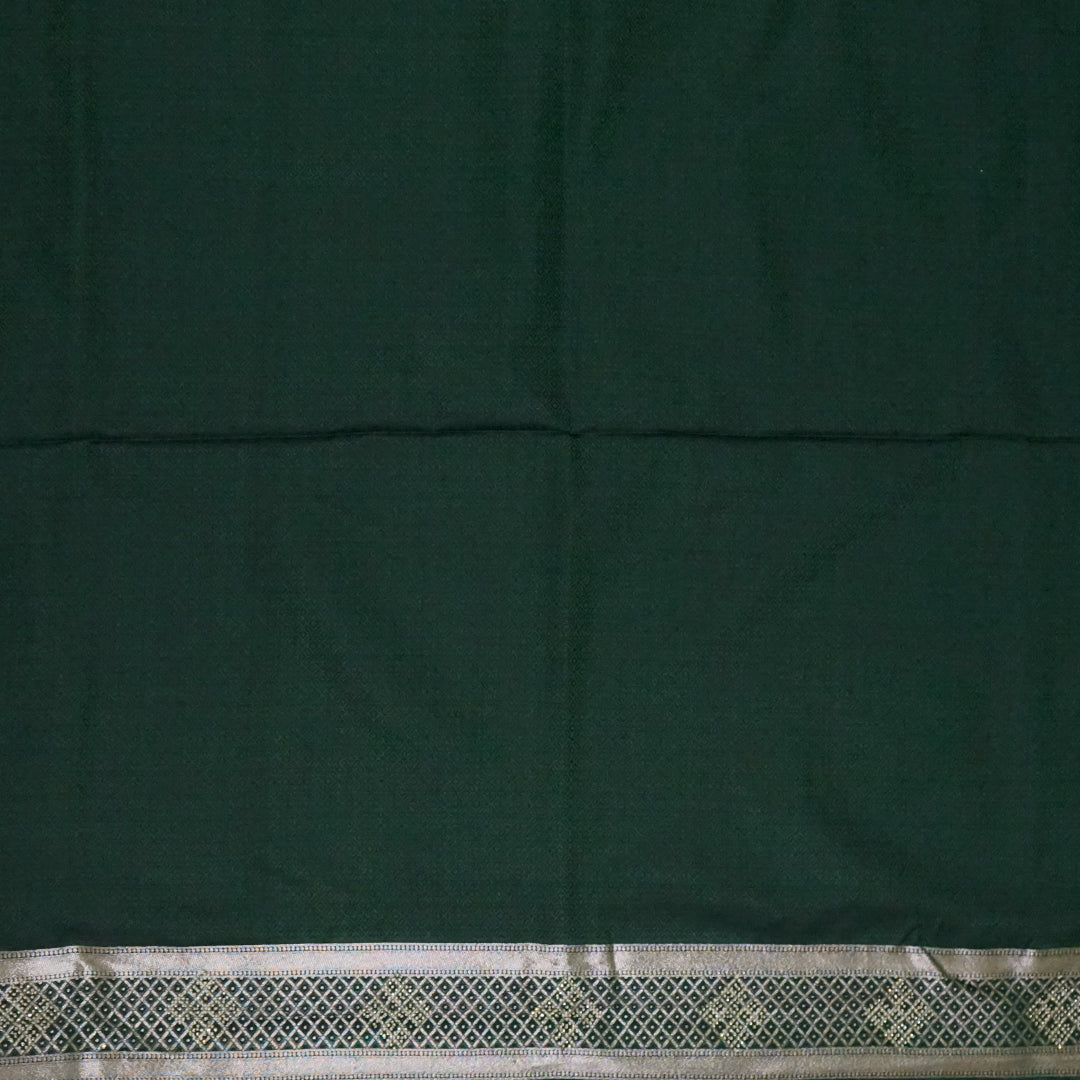 Rithvi Satin Emerald-green shade color adorned with intricate golden zari embroidery