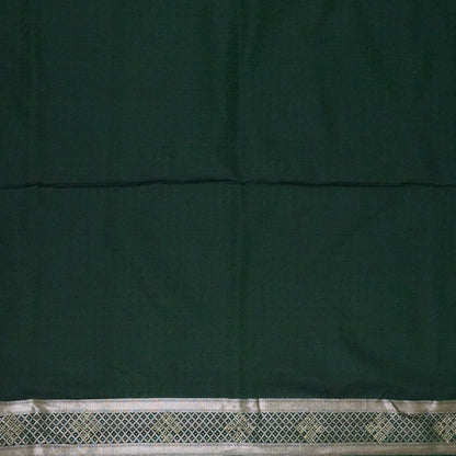 Rithvi Satin Emerald-green shade color adorned with intricate golden zari embroidery