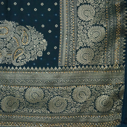 Tarani Silk saree in deep navy blue shade with a rich golden zari weave.