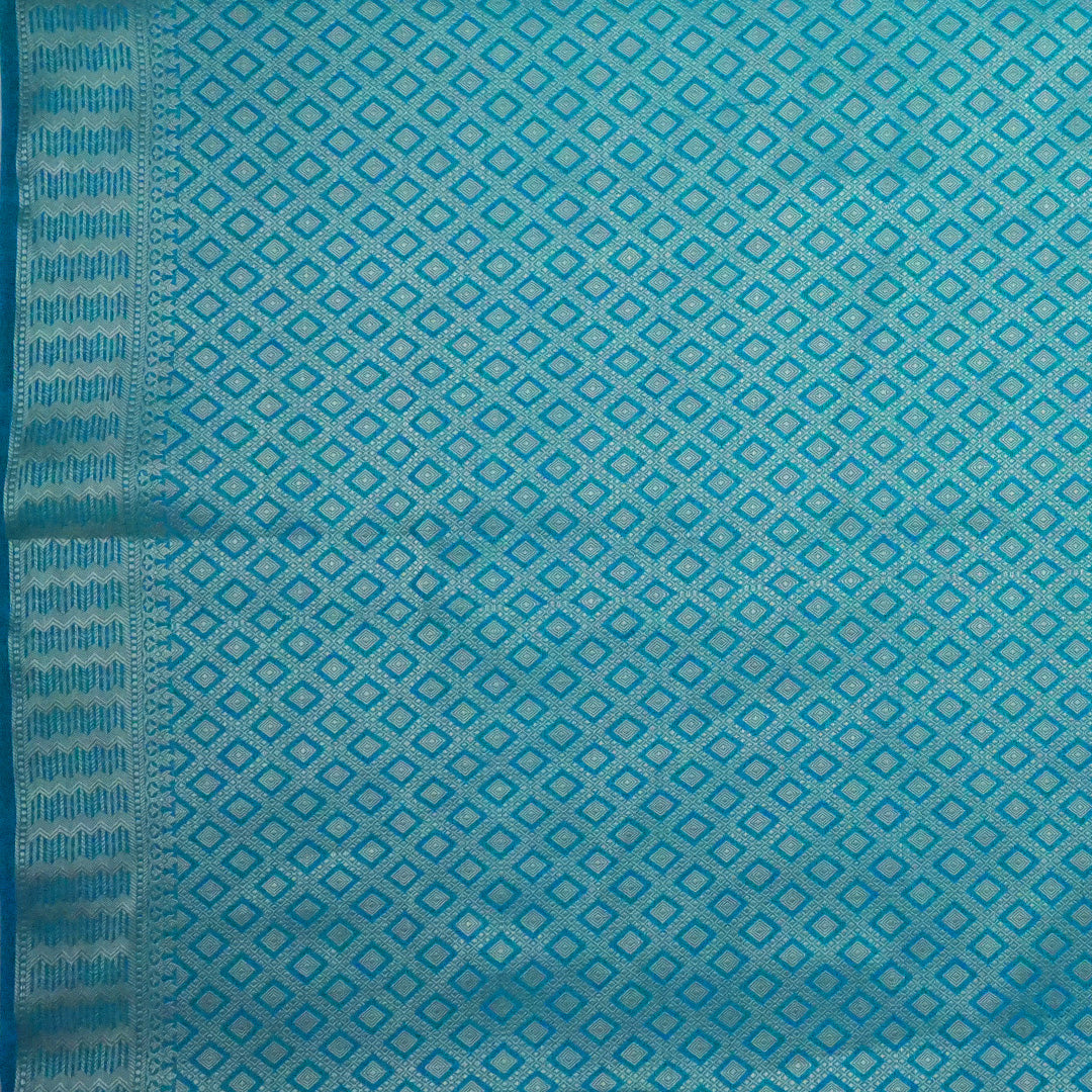 Neera Silk Saree in Vibrant Turquoise Blue with Floral works