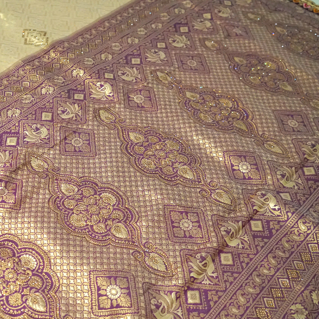 Golden cream Raj Virasat Silk saree with Deep purple base and heavy embroidery.