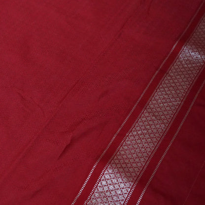 Rithvi Satin Deep red color adorned with intricate golden zari embroidery