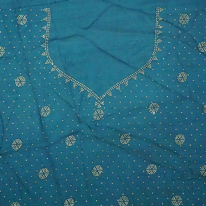 Ratnalekha silk saree in rich teal-blue base adorned with intricate gold zari work,