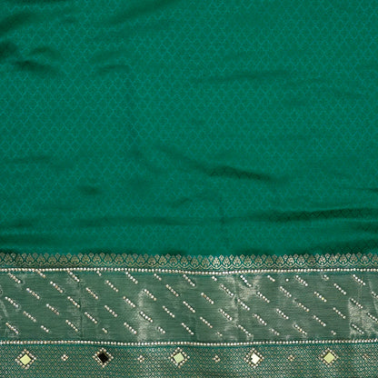 Samrudhi silk saree in vibrant combination of emerald green and lime green with a lustrous Banarasi silk finish.