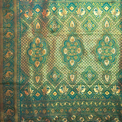 Peach-orange Raj Virasat Silk saree with Deep purple base and heavy embroidery.