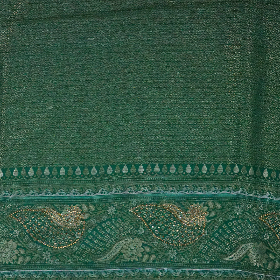 Madhur Bela soothing teal-green hue shade with a golden undertone.