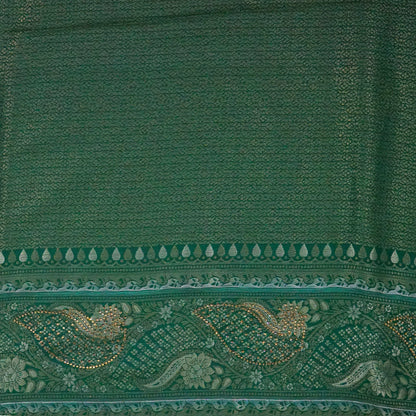 Madhur Bela soothing teal-green hue shade with a golden undertone.