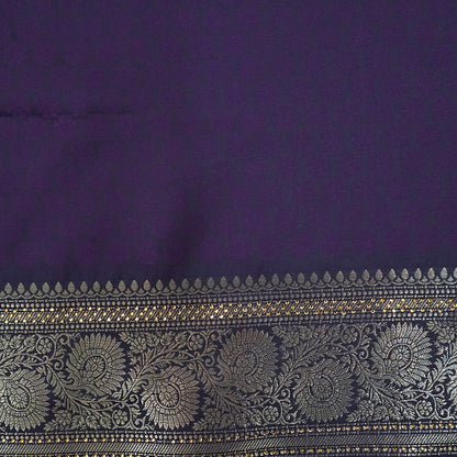 Tarani Silk saree in royal deep purple shade with a rich golden zari weave.