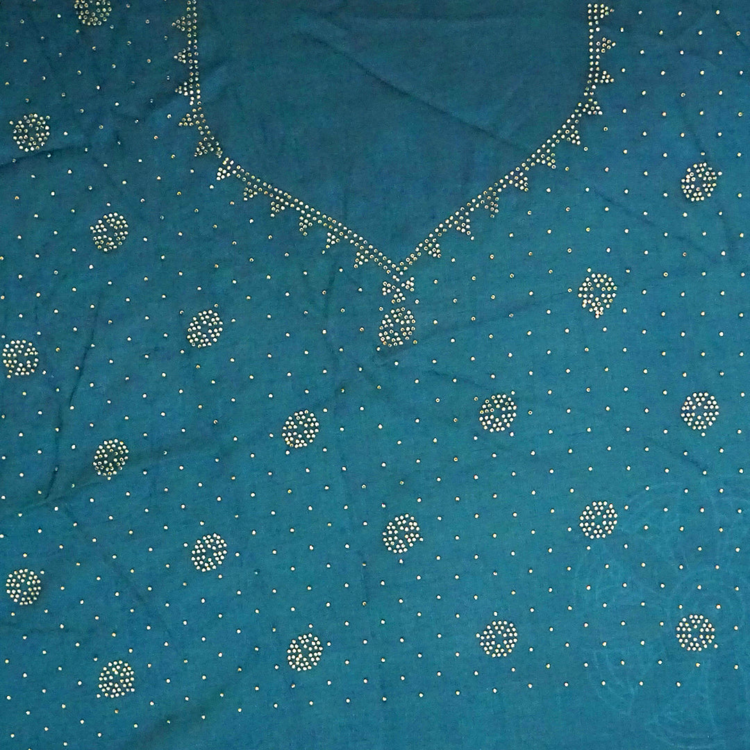 Ratnalekha silk saree in rich teal-blue base adorned with intricate gold zari work,