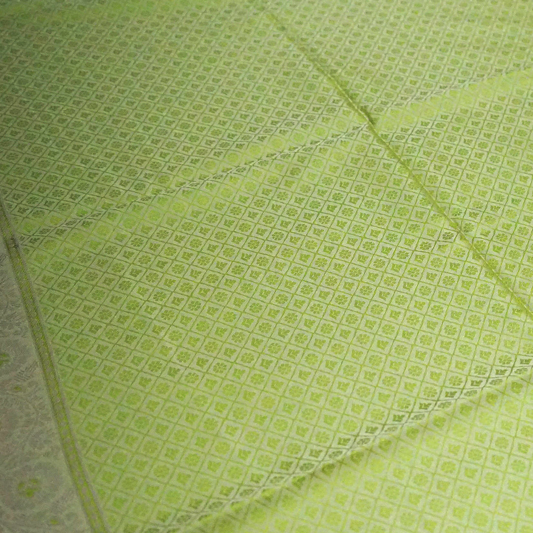 Soothing light olive green shade Suhani Silk with a subtle golden sheen