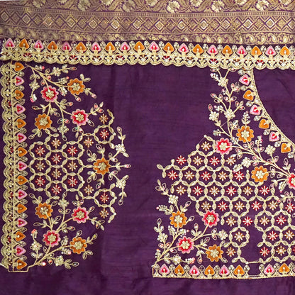 Golden cream Raj Virasat Silk saree with Deep purple base and heavy embroidery.