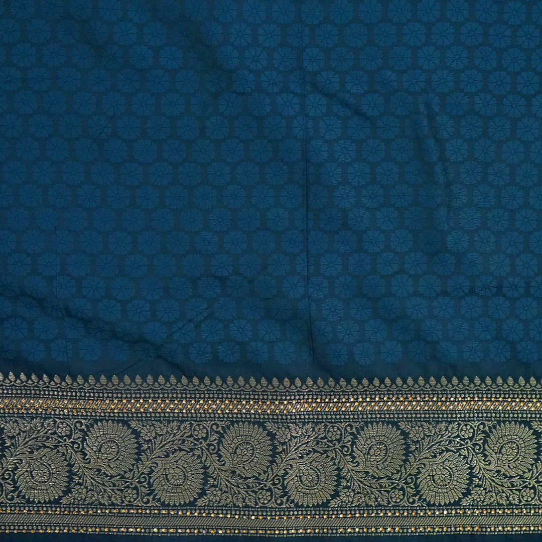 Tarani Silk saree in deep navy blue shade with a rich golden zari weave.