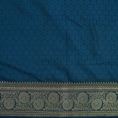 Tarani Silk saree in deep navy blue shade with a rich golden zari weave.