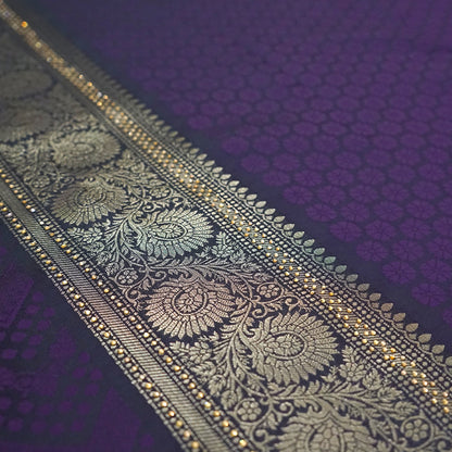 Tarani Silk saree in royal deep purple shade with a rich golden zari weave.