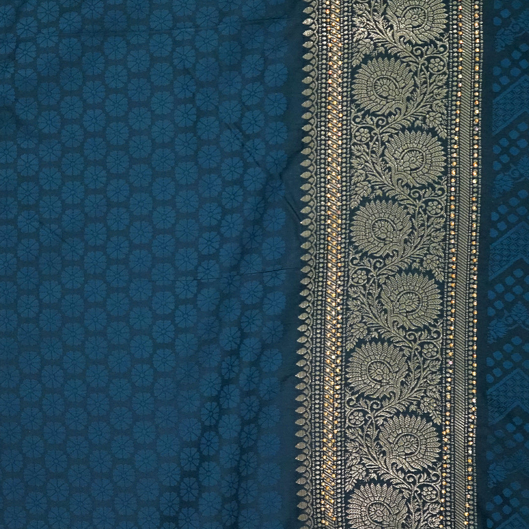 Tarani Silk saree in deep navy blue shade with a rich golden zari weave.