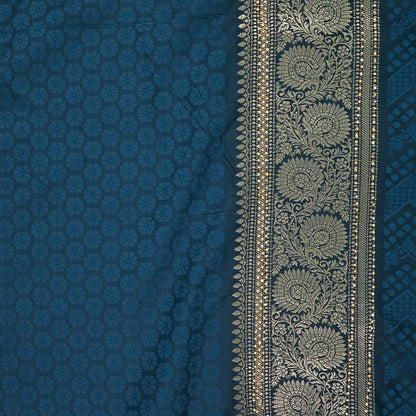 Tarani Silk saree in deep navy blue shade with a rich golden zari weave.