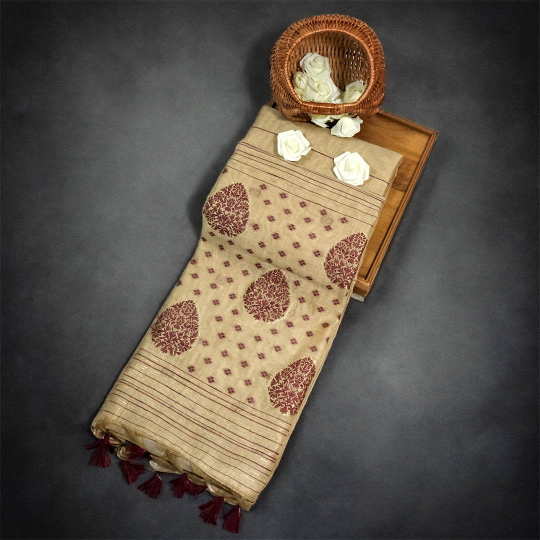 Beige Ishvani Tussar saree with Maroon tassels