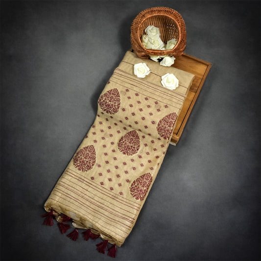 Beige Ishvani Tussar saree with Maroon tassels