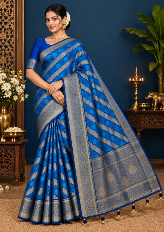 Megha Silk saree in rich royal blue with alternating metallic gold zari stripes.