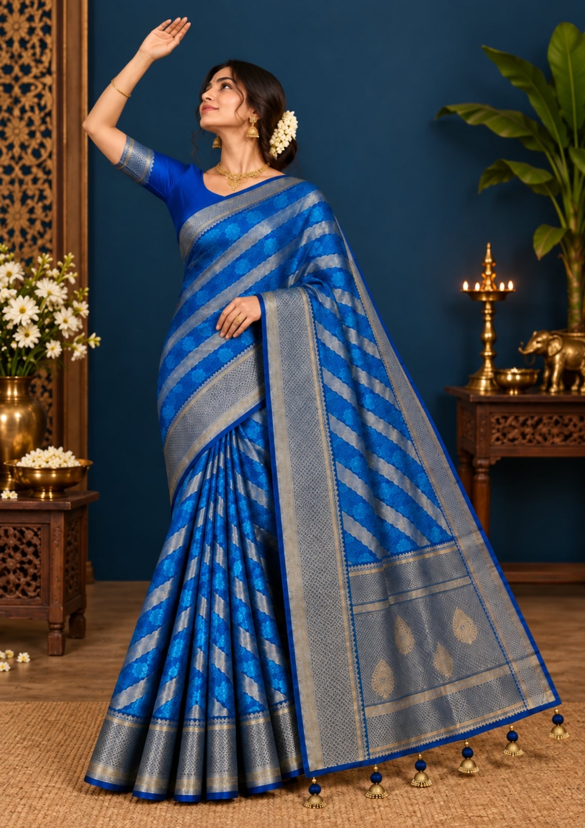 Megha Silk saree in rich royal blue with alternating metallic gold zari stripes.