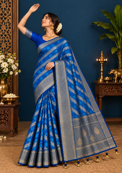 Megha Silk saree in rich royal blue with alternating metallic gold zari stripes.