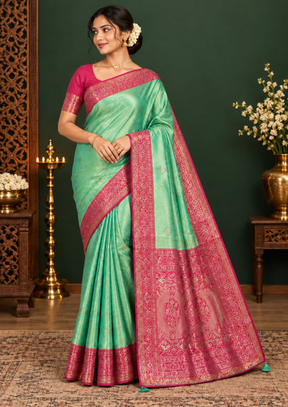 Mint Green Raj Virasat Silk saree with Deep purple base and heavy embroidery.