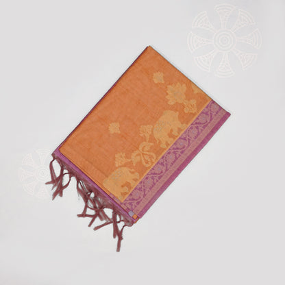 Golden Amber Ambari Silk Tussar with Dusky Mauve border and Zari works.