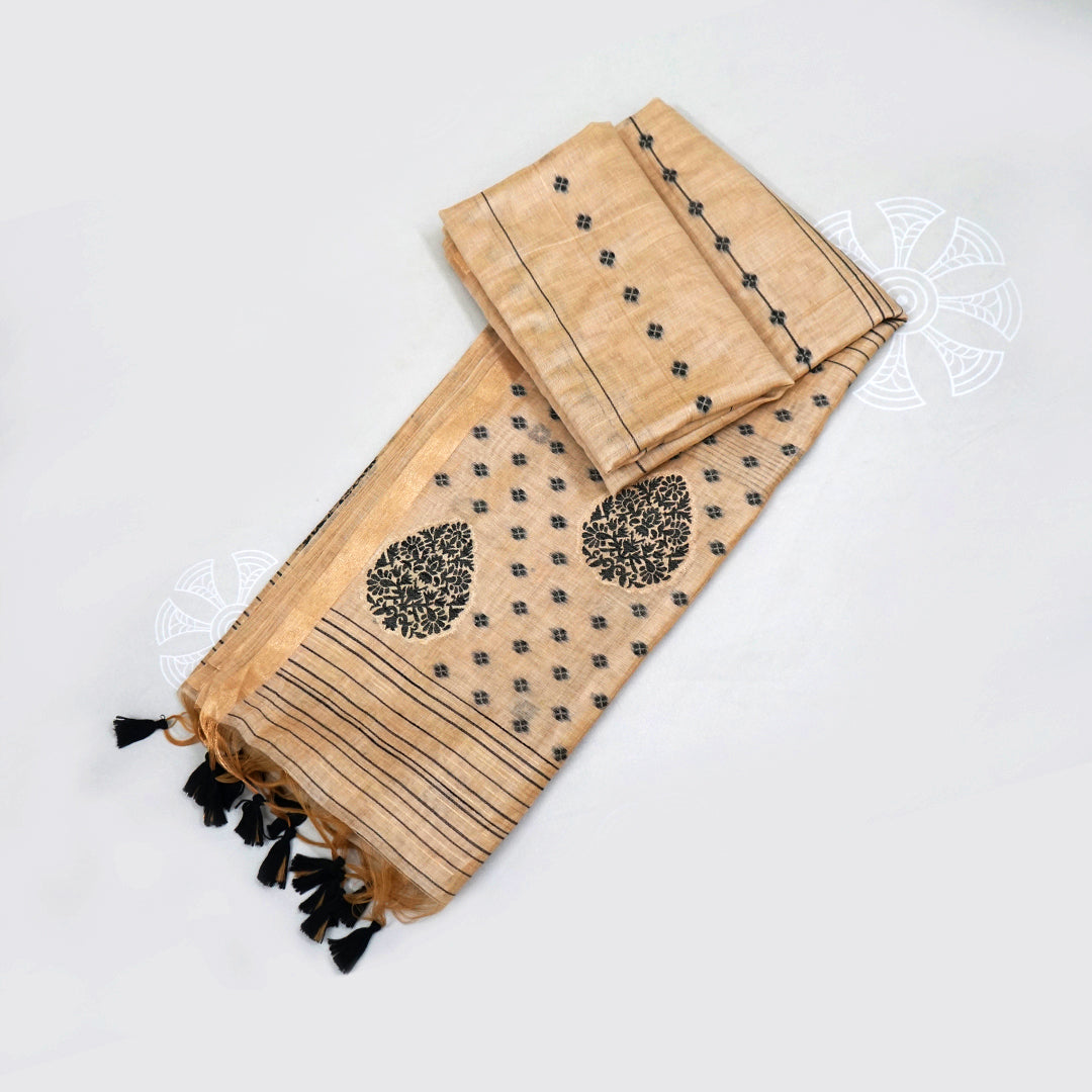 Beige Ishvani Tussar saree with black tassels