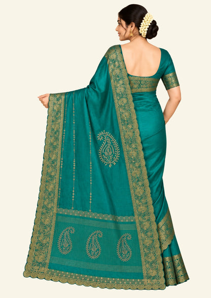 Ratnalekha Silk saree in rich emerald-green base accentuated with intricate gold zari work