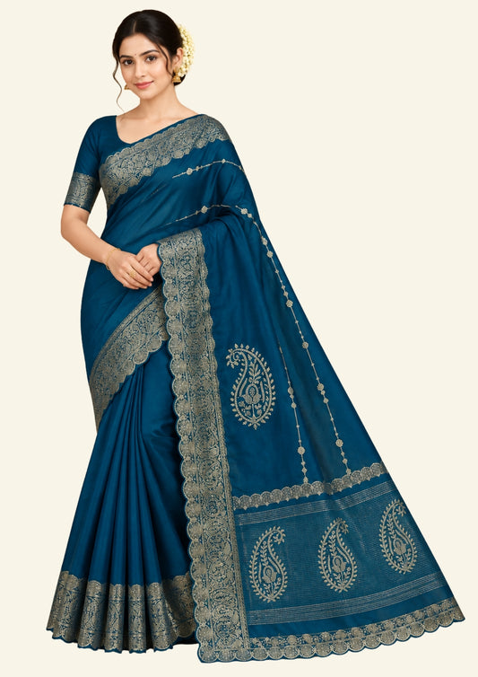 Ratnalekha silk saree in rich teal-blue base adorned with intricate gold zari work,
