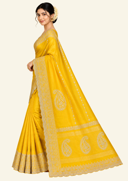 Ratnalekha Silk saree in rich golden yellow base highlighted with intricate silver zari embroidery