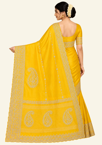 Ratnalekha Silk saree in rich golden yellow base highlighted with intricate silver zari embroidery