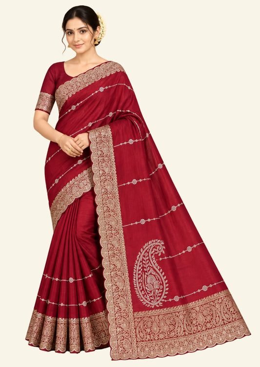 Ratnalekha silk saree in vibrant deep red base accentuated with intricate gold zari embroidery,