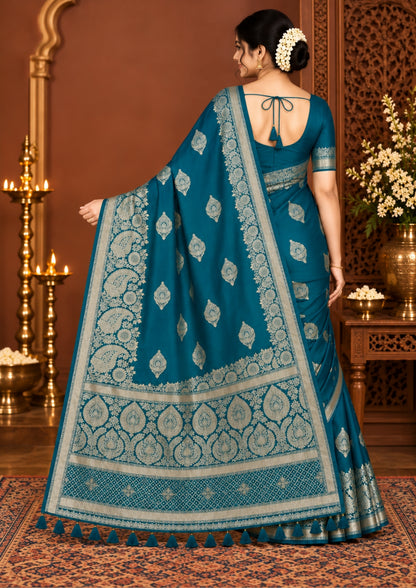 Rithvi Satin Teal blue color adorned with intricate golden zari embroidery