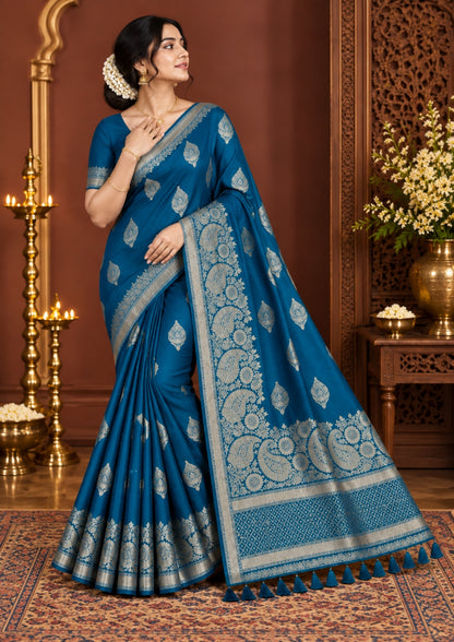 Rithvi Satin Teal blue color adorned with intricate golden zari embroidery